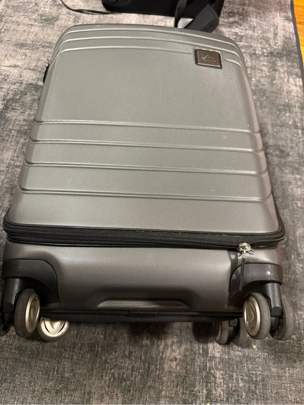 Unixes Gray Hard-Shell Spinner Carry-On Luggage from Macy’s wads $160